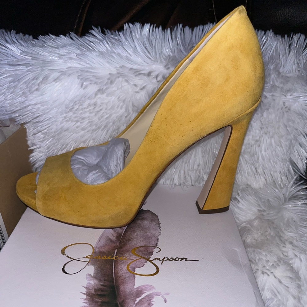 Brand new high heels. Mustard color.